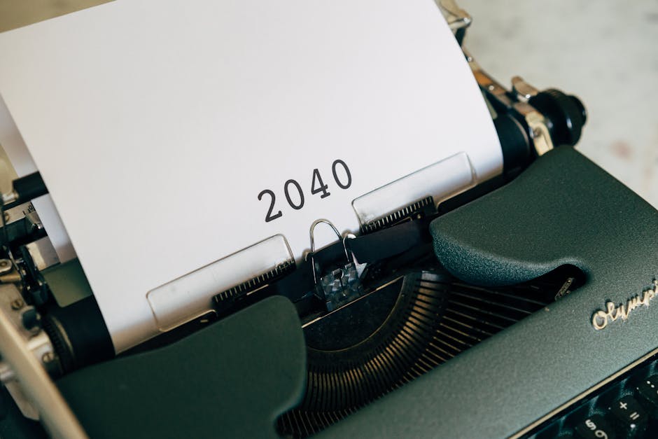 Close-up of a vintage typewriter with a paper showing the year 2040, capturing a nostalgic yet futuristic feel.