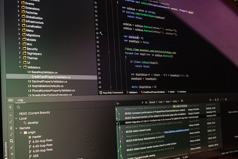Close-up of software development tools displaying code and version control systems on a computer monitor.